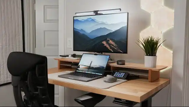 Simple, quiet workspace with a laptop in soft natural light representing dependable web hosting